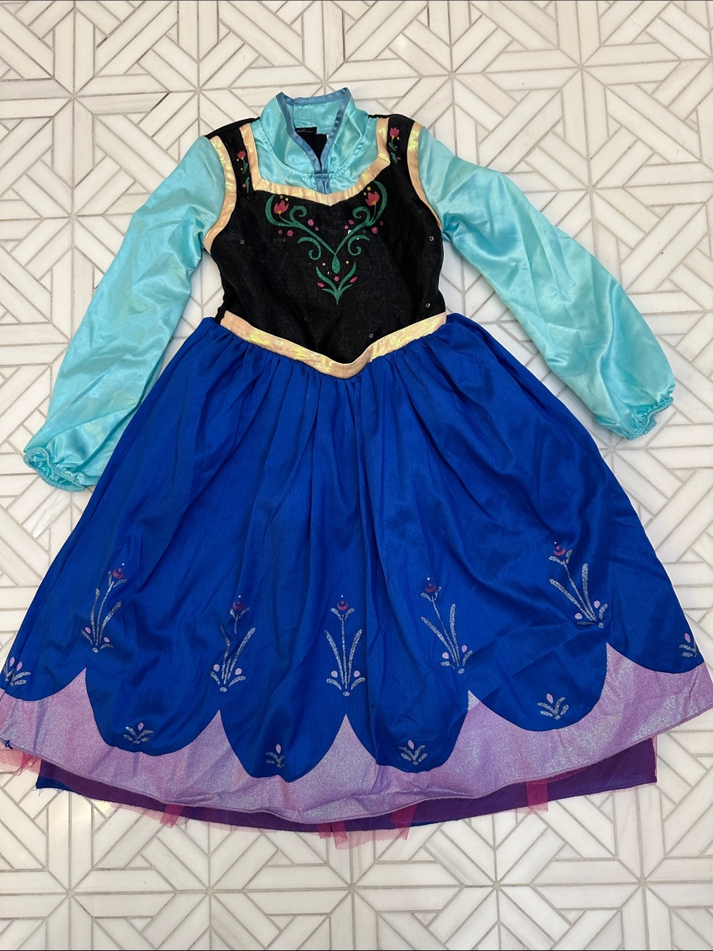 Disney authentic Elsa Girls Blue and Black Princess Costume with Aqua Sleeves.